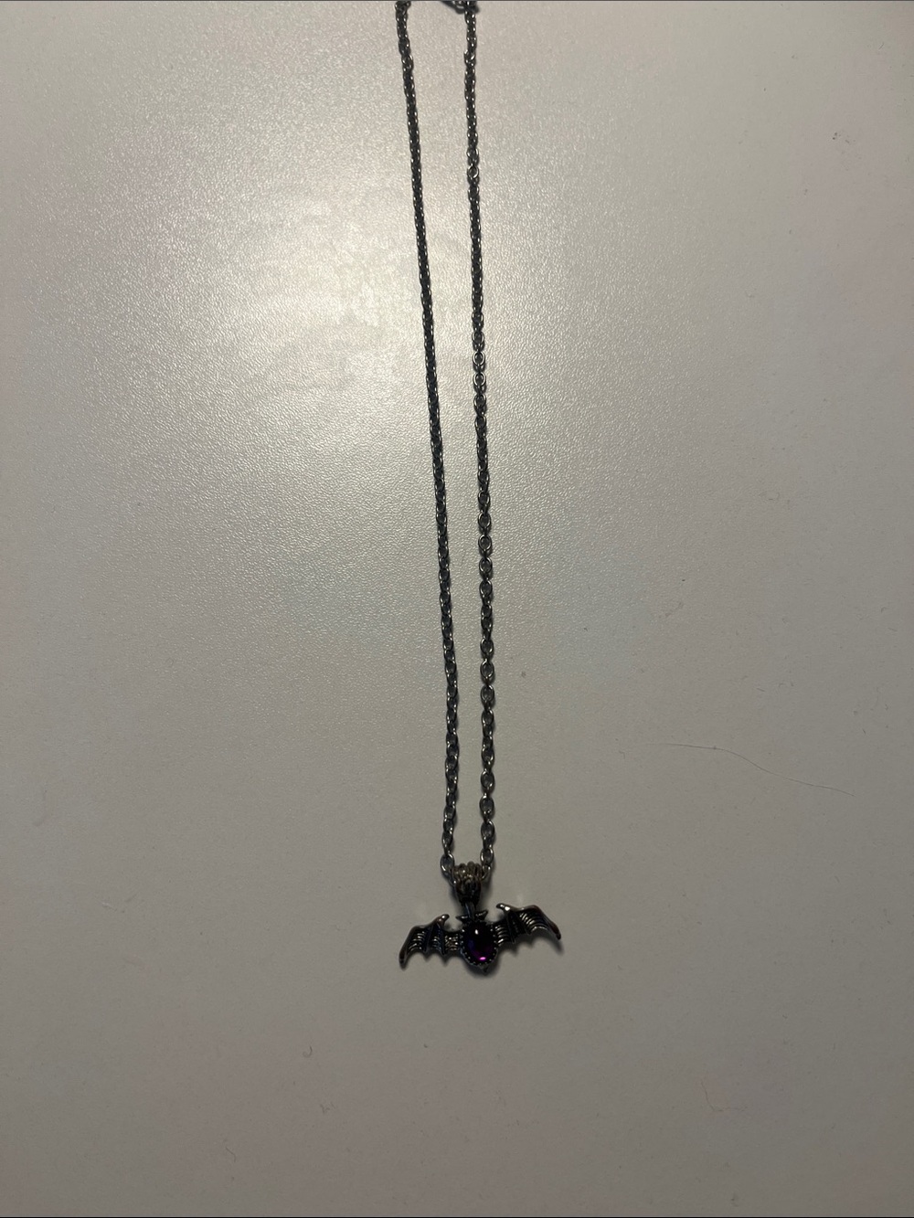 Sterling Silver Bat Pendant Necklace with Purple Gem